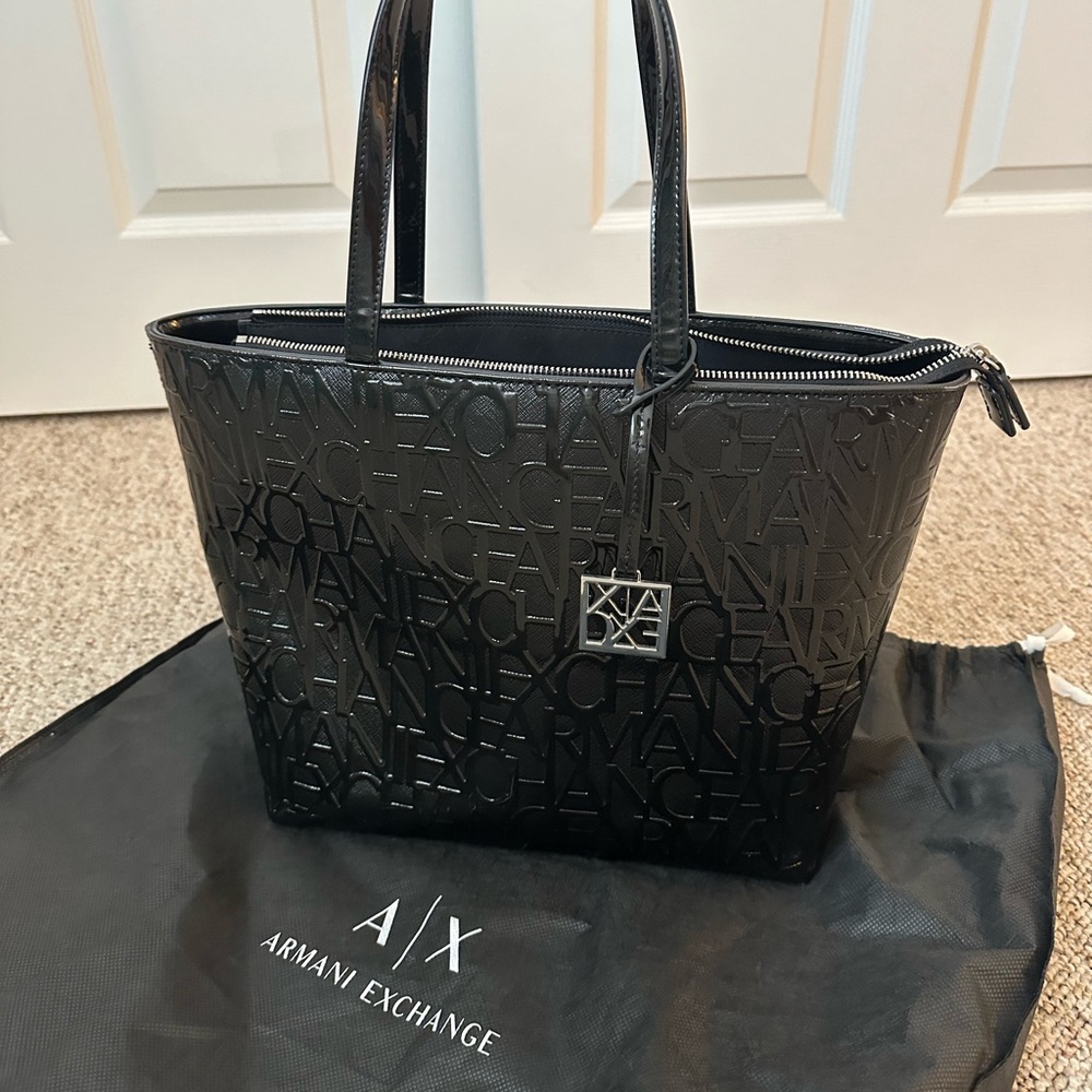 A black Armani Exchange Embossed shoulder bag